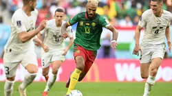 Eric Maxim Choupo-Moting of Cameroon controls the ball against Nikola Milenkovic of Serbia.