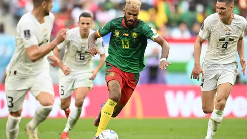Eric Maxim Choupo-Moting of Cameroon controls the ball against Nikola Milenkovic of Serbia.
