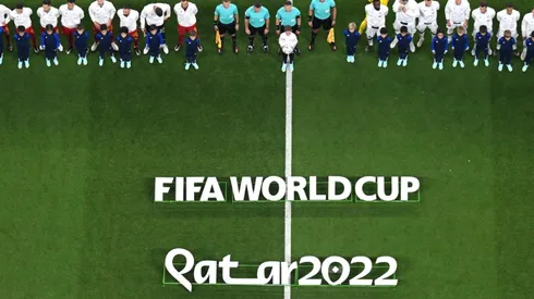 Players line up prior to a 2022 Qatar World Cup game