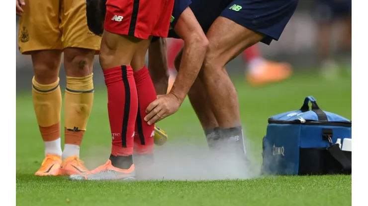 A Bilbao player receives some medical treatment via a spray during the pre season friendly match between Newcastle United and Athletic Bilbao