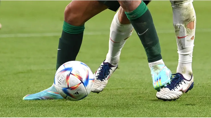 Players fight for the ball at the World Cup