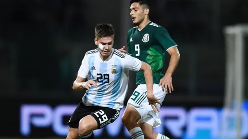 Juan Foyth of Argentina against Raul Jimenez of Mexico in an international friendly in 2018.