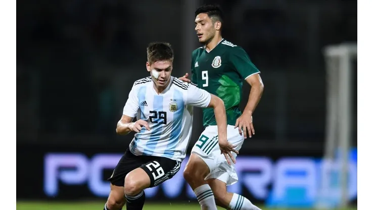 Juan Foyth of Argentina against Raul Jimenez of Mexico in an international friendly in 2018.