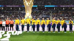 Australian players stand for the national anthem