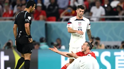 Gareth Bale of Wales reacts towards referee Abdulrahman Al Jassi
