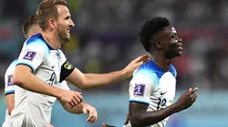 Bukayo Saka (R) of England celebrates scoring his team's fourth goal