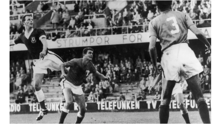 Welsh centre-forward John Charles (left) makes an attack on the Mexican goal during the Wales-Mexico World Cup match in Stockholm