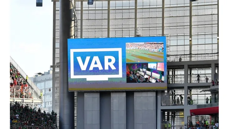 A VAR review displayed on a big screen.