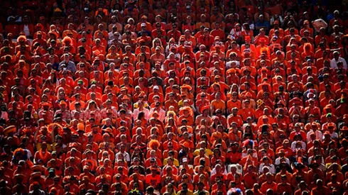 A tide of people dressed in the same color, accompanying the World Cup passion.