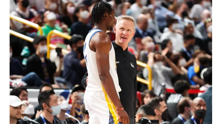 Jonathan Kuminga (left) and Steve Kerr.