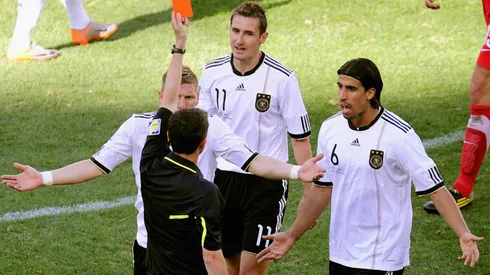 Miroslav Klose of Germany is awarded a red card at 2010 World Cup