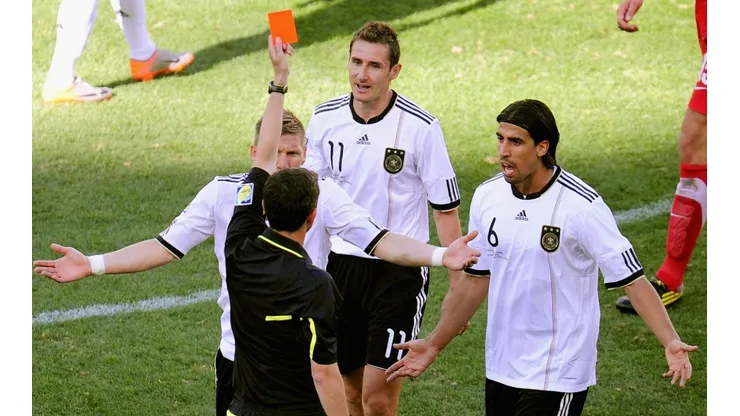 Miroslav Klose of Germany is awarded a red card at 2010 World Cup
