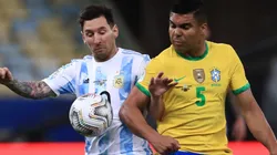 Messi (left) of Argentina fighting for ball control against Casemiro of Brazil