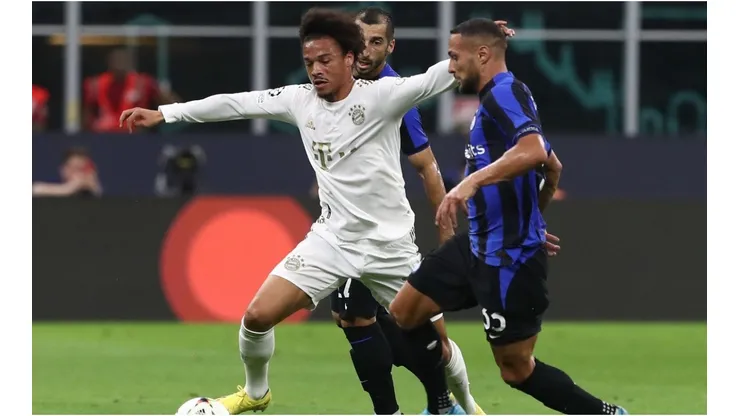 Leroy Sane’ of FC Bayern Munchen competes for the ball with Danilo D’Ambrosio (R) and Henrikn Mkhitaryan (back) of FC Internazionale