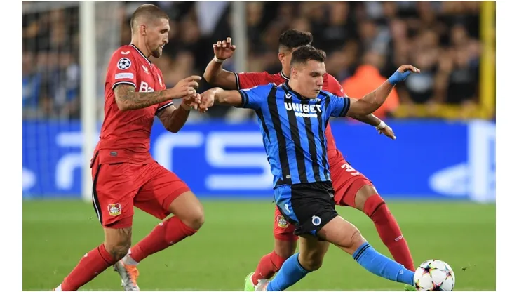 Ferran Jutgla of Club Brugge is challenged by Robert Andrich Bayer Leverkusen