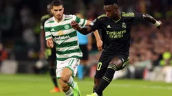Vinicius Junior of Real Madrid evades Liel Abada of Celtic
