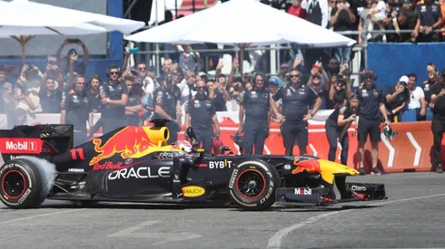 Red Bull Racing driver, Sergio Perez, drives through the streets of Guadalajara