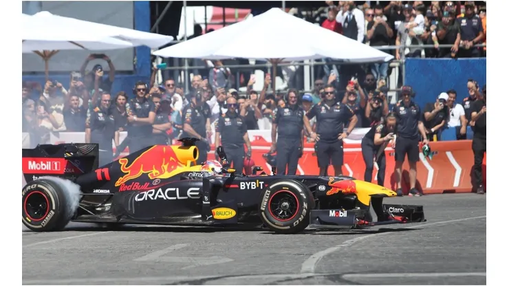 Red Bull Racing driver, Sergio Perez, drives through the streets of Guadalajara