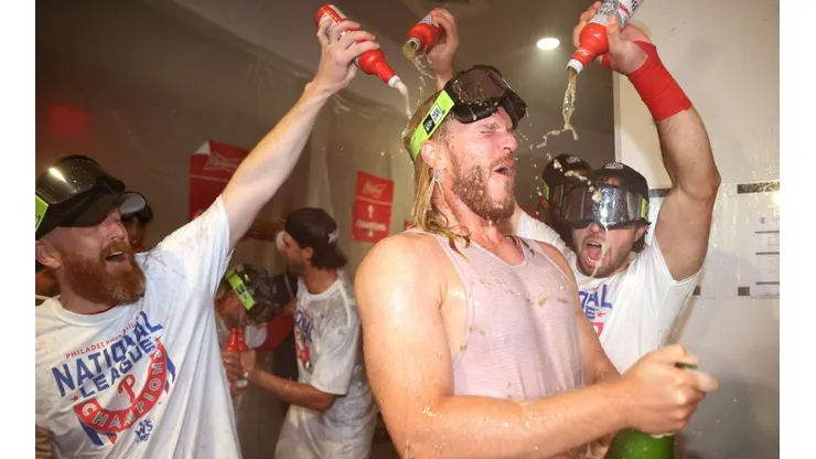 Noah Syndergaard #43 of the Philadelphia Phillies celebrates with his teammates in the locker room