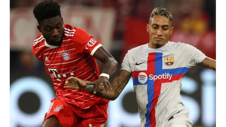 Alphonso Davies of Bayern Munich and Raphinha of FC Barcelona