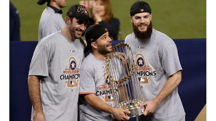 The 2017 Houston Astros hoist the Commissioner's Trophy