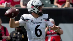 QB Ben Bryant of the Cincinnati Bearcats thowring a pass