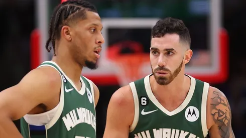 Lindell Wigginton and Luca Vildoza of the Milwaukee Bucks