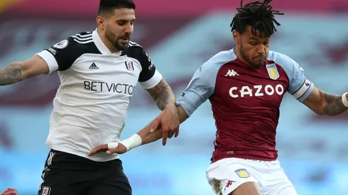 Aleksandar Mitrovic of Fulham and Tyrone Mings of Aston Villa