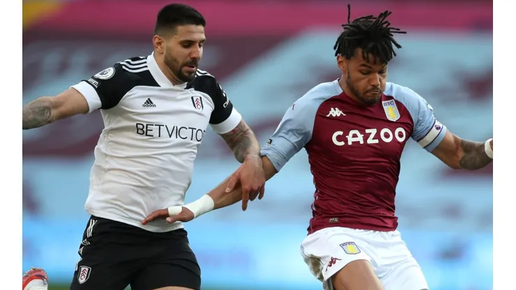 Aleksandar Mitrovic of Fulham and Tyrone Mings of Aston Villa