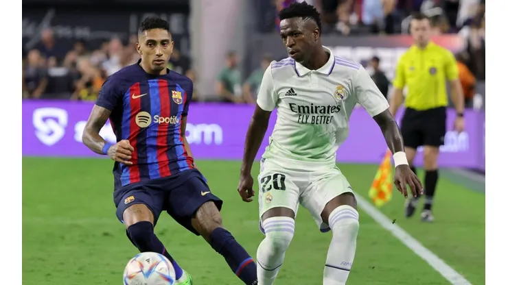 Vinicius of Real Madrid and Raphinha of Barcelona