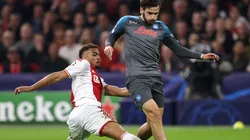 Jurrien Timber of Ajax battles for the ball with Khvicha Kvaratskhelia of Napoli