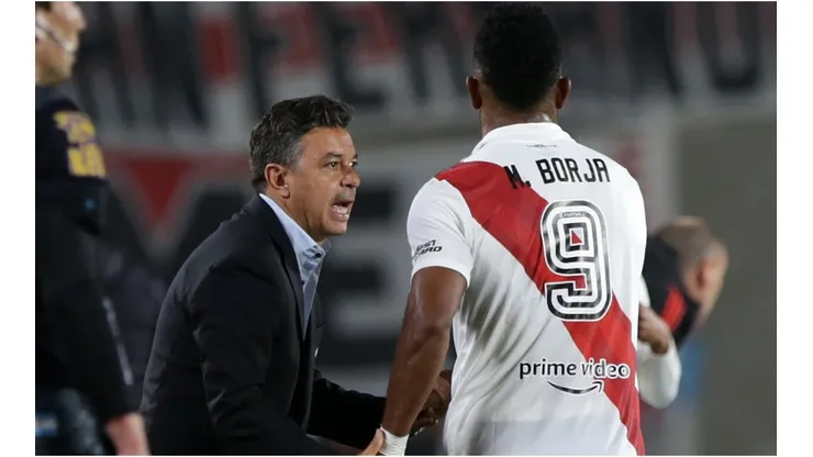 Miguel Borja of River Plate celebrates with coach Marcelo Gallardo