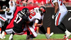 Grady Jarrett (left) taking down Tom Brady in 2022 during a Week 5 game, Bucs vs Falcons