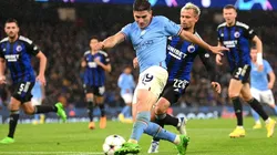 Julian Alvarez of Manchester City shoots under pressure from Peter Ankersen of FC Copenhagen