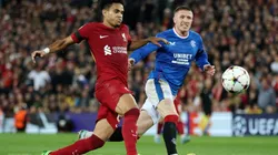 Luis Diaz of Liverpool shoots under pressure from John Lundstram of Rangers