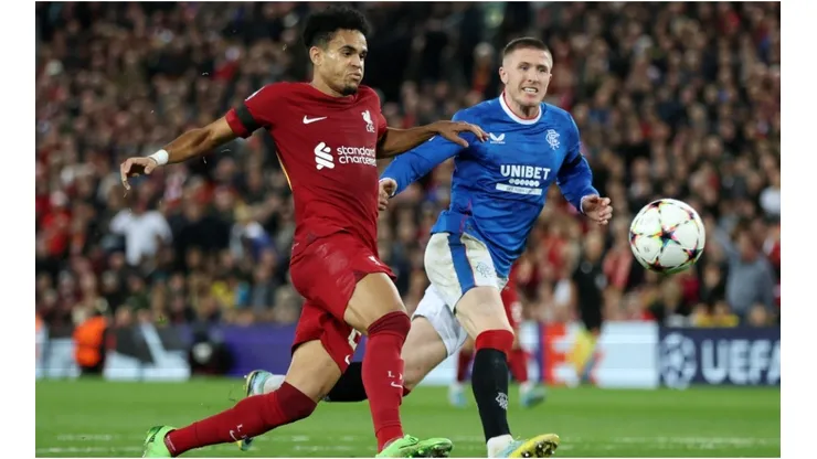 Luis Diaz of Liverpool shoots under pressure from John Lundstram of Rangers