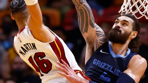 Caleb Martin of the Miami Heat and Steven Adams of the Memphis Grizzlies