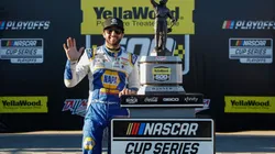 Chase Elliott celebrates after winning the YellaWood 500