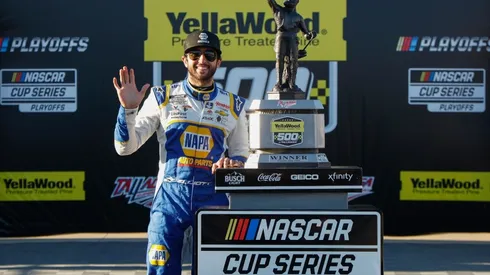 Chase Elliott celebrates after winning the YellaWood 500