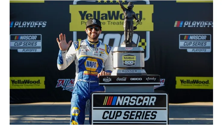 Chase Elliott celebrates after winning the YellaWood 500