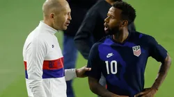 Head coach Gregg Berhalter of the United States talks with Kellyn Acosta #10 against El Salvador during the second half at Inter Miami CF Stadium on December 09, 2020 in Fort Lauderdale, Florida.