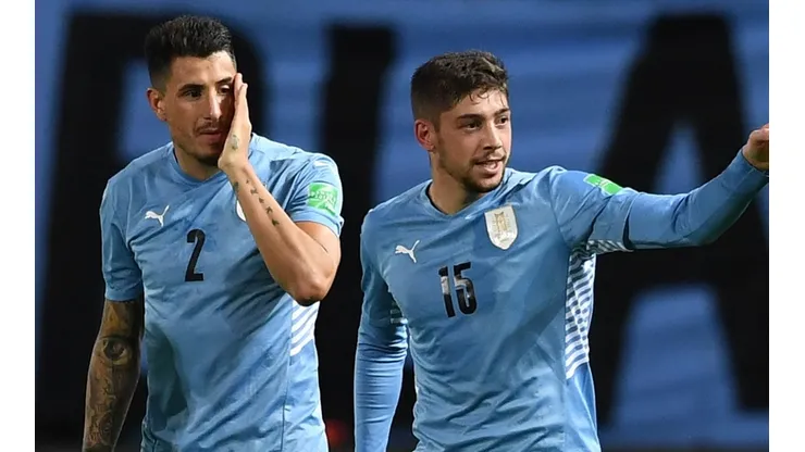 Federico Valverde with Jose Maria Gimenez of Uruguay
