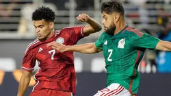 Luis Diaz (Colombia / left) and Nestor Araujo (Mexco / right) fight for a ball during 2022 International Friendly game.