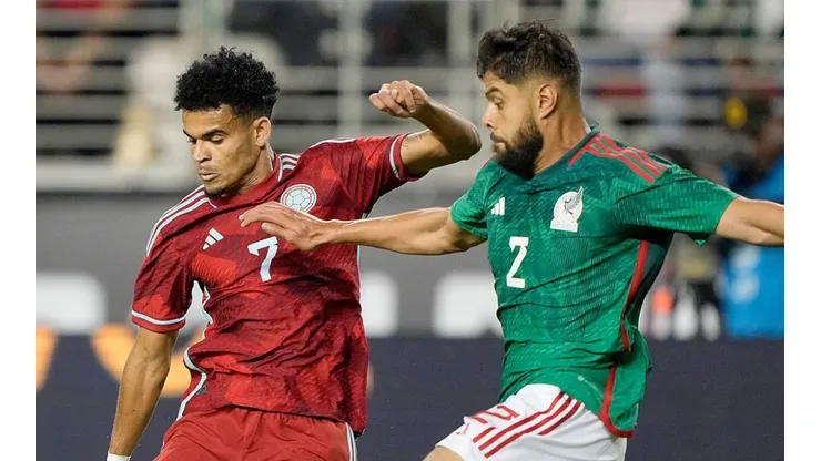 Luis Diaz (Colombia / left) and Nestor Araujo (Mexco / right) fight for a ball during 2022 International Friendly game.