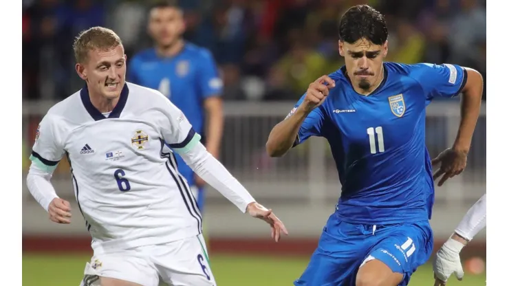 Shayne Lavery of Northern Ireland and Donat Rrudhani of Kosovo