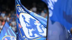 Chelsea fans wave flags prior to the Premier League match between Chelsea FC and West Ham United at Stamford Bridge on September 03, 2022 in London, England.