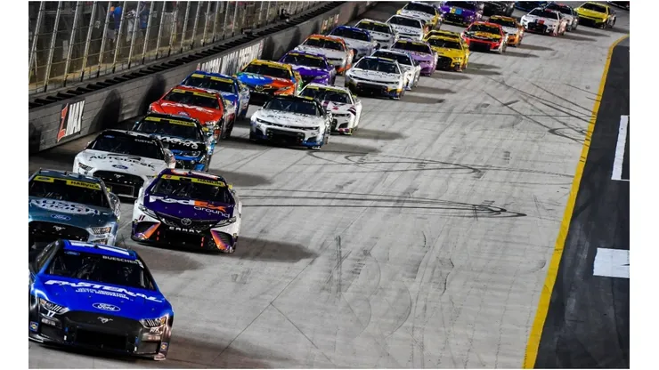Chris Buescher leads the field during the Bass Pro Shops Night Race