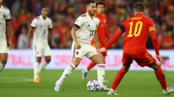 Eden Hazard of Belgium tracked by Aaron Ramsey of Wales