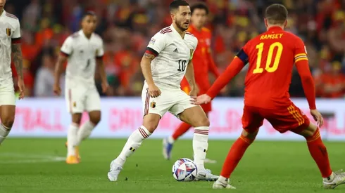 Eden Hazard of Belgium tracked by Aaron Ramsey of Wales