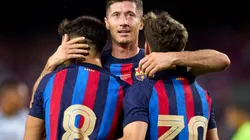Barcelona players celebrate after scoring a goal